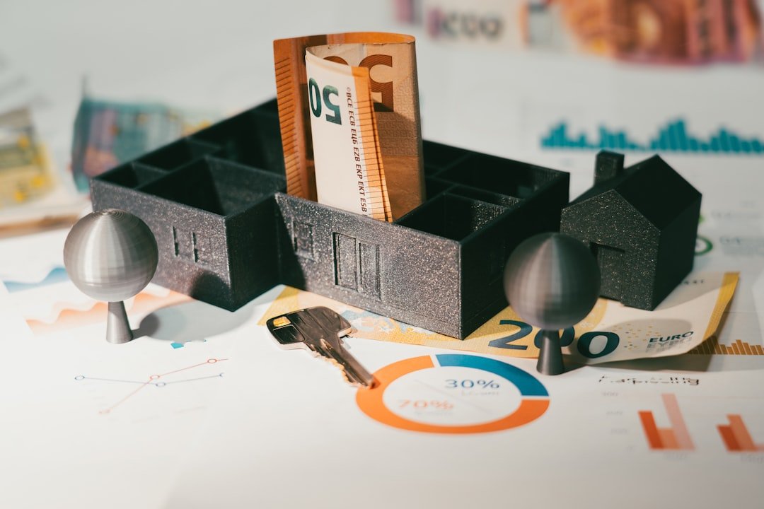 Real estate finance. House model table money banknotes. Door key.
