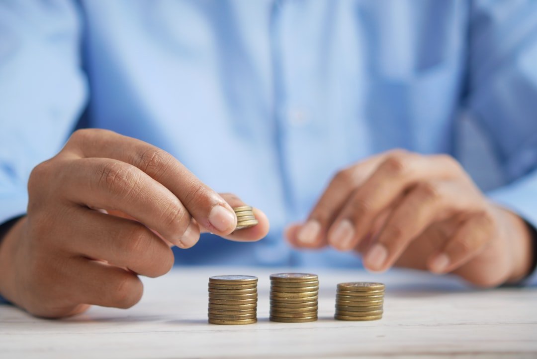 Crafting Captivating Headlines: Your awesome post title goes here a-person-stacking-coins-on-top-of-a-table-jpqyfk7gb4w